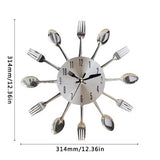 Dimensions de l'horloge murale cuisine en forme de fourchettes et cuillères de 30 cm
