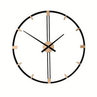 Grande horloge murale ronde de 60 cm en métal noir avec détails dorés sur fond blanc