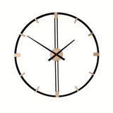 Grande horloge murale ronde de 60 cm en métal noir avec détails dorés sur fond blanc