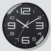 Horloge murale ronde noire au design contemporain, cadran sombre et aiguilles blanches pour une cuisine ou un salon contout cadran blanc