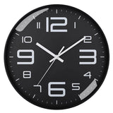 Horloge murale ronde noire au design contemporain, cadran sombre et aiguilles blanches pour une cuisine ou un salon