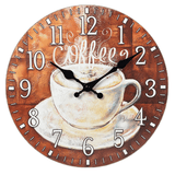 horloge murale pour la cuisine décorée avec une tasse de café et des cupcakes