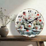 Horloge murale florale vintage avec une théière blanche, deux tasses de thé et des fleurs rouges dans un décor naturel chaleureux.