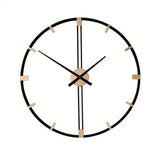 Horloge murale décorative pour salon au style minimaliste en métal noir et touches dorées sur fond blanc.