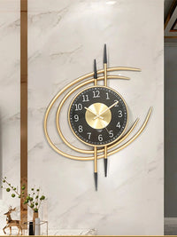 horloge-murale-design-fer-courbe-doree