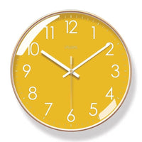 Horloge murale jaune ronde de 30 cm au design moderne et minimaliste, avec chiffres et aiguilles blancs, décoration murale pour salon, chambre ou cuisine.