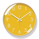 Horloge murale jaune ronde de 30 cm au design moderne et minimaliste, avec chiffres et aiguilles blancs, décoration murale pour salon, chambre ou cuisine.