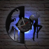 Horloge murale vinyle pole dance lumineuse LED jeu d'ombres silhouettes positives négatives.