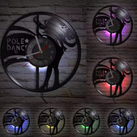 Horloge murale circulaire vinyle pole dance rétroéclairage LED motif drapeau et danseuse.