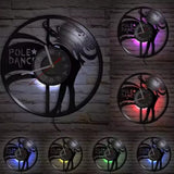Horloge murale circulaire vinyle pole dance rétroéclairage LED motif drapeau et danseuse.