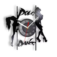 Horloge murale disque vinyle pole dance avec silhouettes danseuses et texte urbain.