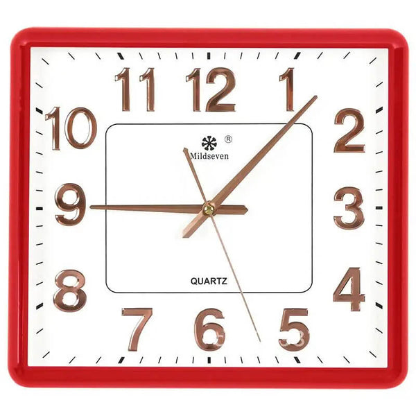 une horloge murale vintage année 50 couleur rouge