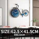 grande horloge murale design contemporaine en forme de vélo de diamètre 60 cm x 40 cm