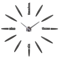 horloge_murale_design_lettre_gris_foncé