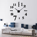 horloge_murale_design_a_coller_salon_noir