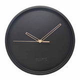 Horloge murale style scandinave et nordique avec quartz comme mécanisme sans bruit tic-tac pour installer dans un salon ou une cuisine moderne couleur noir