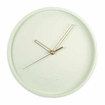 Horloge murale style scandinave et nordique avec quartz comme mécanisme sans bruit tic-tac pour installer dans un salon ou une cuisine moderne couleur verte