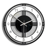Horloge murale design contemporain noir et blanc à cadran ajouré géométrique de 30 cm