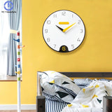 horloge murale scandinave au style design noir blanc jaune épuré pour la chambre de la maison