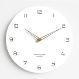 horloge murale scandinave forme ronde en bois de couleur blanche