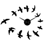 horloge_murale_design_hirondelles_noir