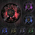 horloge murale en vinyle dans la salle de sport avec lumiere LED pour la decoration