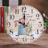 horloge murale de cuisine avec une tasse de café et des fleurs illustrant le home sweet home pour votre décoration intérieure au style vintage et rétro sur une table