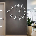 horloge_murale_design_hirondelles_mur