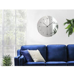 horloge murale originale avec effet miroir design dans un salon