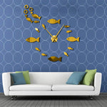 horloge murale stickers avec des poissons de forme ronde couleur doré et système à quartz pour le décoration intérieure de taille géante pour un design parfait.