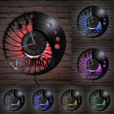 horloge murale vinyle avec lumière LED fibonnaci noir avec art en spirale et nombre avec mouvement à quartz diamètre 30 cm.