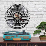 horloge murale vinyle hibou dans le salon