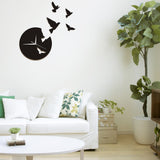 horloge murale originale avec des oiseaux volant dans le salon